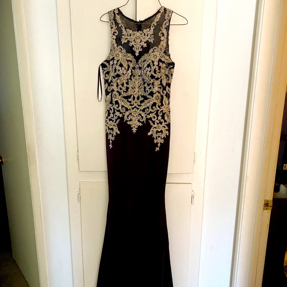 Black and gold sequence dress